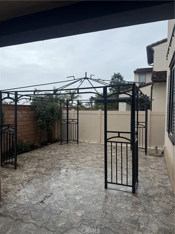a view of a balcony with chairs