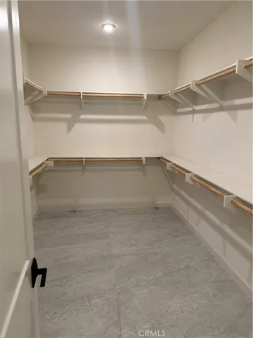 a view of a room with racks on the wall