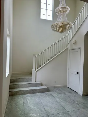 a view of entryway and hall with a window