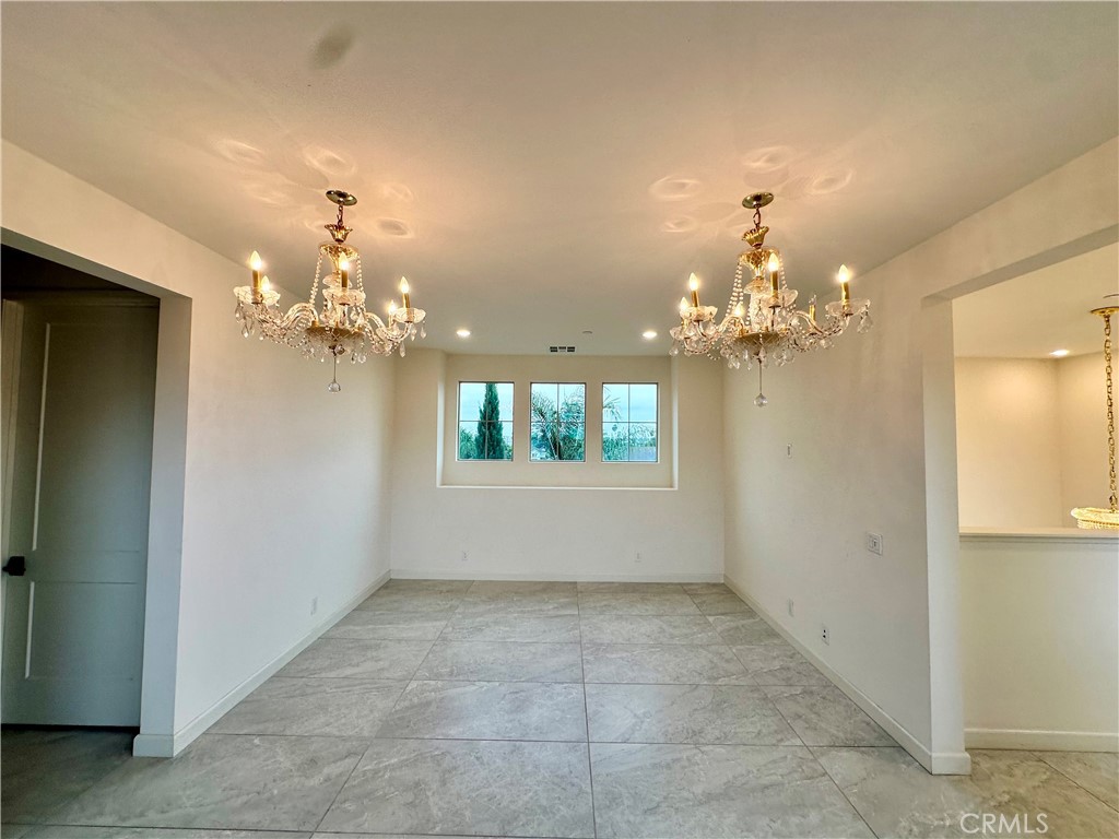 12358 Primrose Avenue Whittier, CA 90602 - Photo 35 of 50 a view of a chandelier in a room with a chandelier