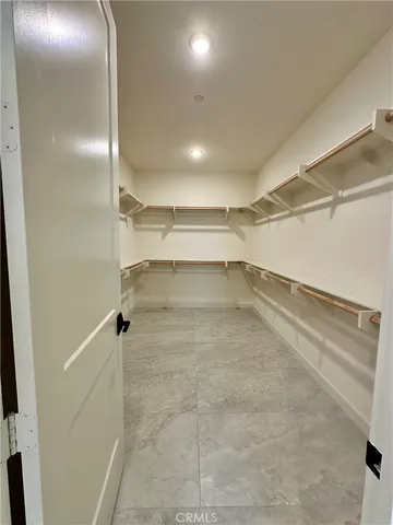 a view of a room with racks on the wall