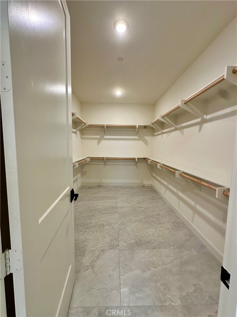 12358 Primrose Avenue Whittier, CA 90602 - Photo 39 of 50 a view of a room with racks on the wall