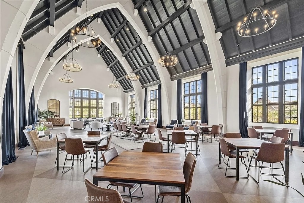 12358 Primrose Avenue Whittier, CA 90602 - Photo 47 of 50 a view of a dining room with furniture a chandelier and wooden floor