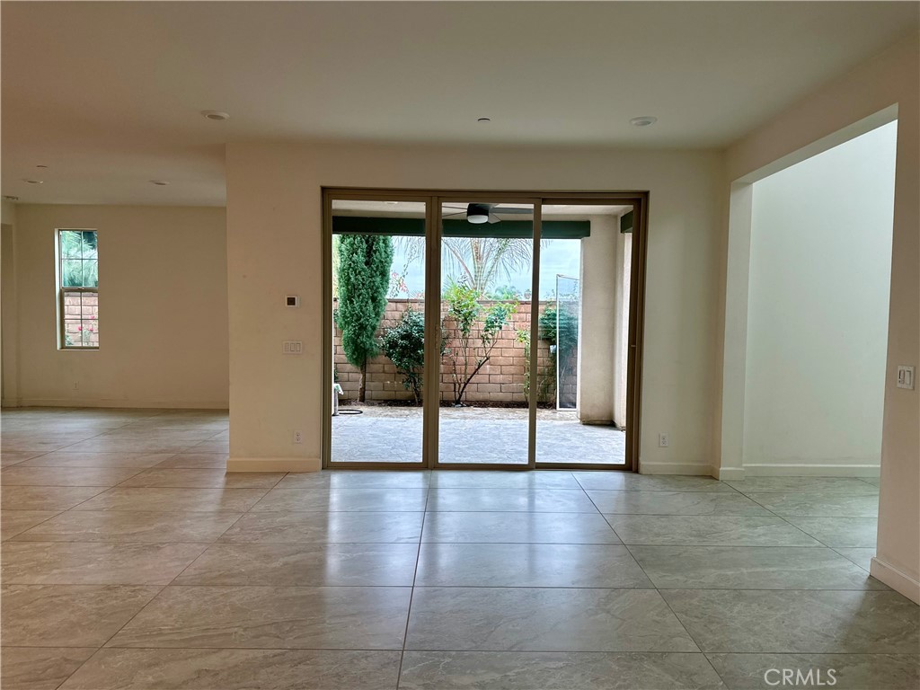 12358 Primrose Avenue Whittier, CA 90602 - Photo 5 of 50 a view of an empty room with glass door