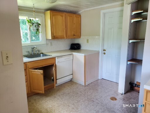 79 Heminway Park Road, Unit 2 Watertown, CT 06795 - Photo 14 of 15 a kitchen with a sink cabinets and a window