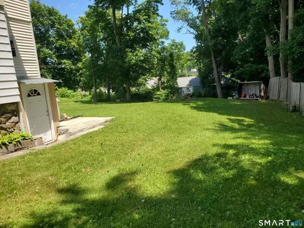 a view of a garden with trees