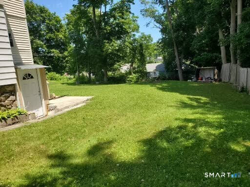 79 Heminway Park Road, Unit 2 Watertown, CT 06795 - Photo 15 of 15 a view of a garden with trees