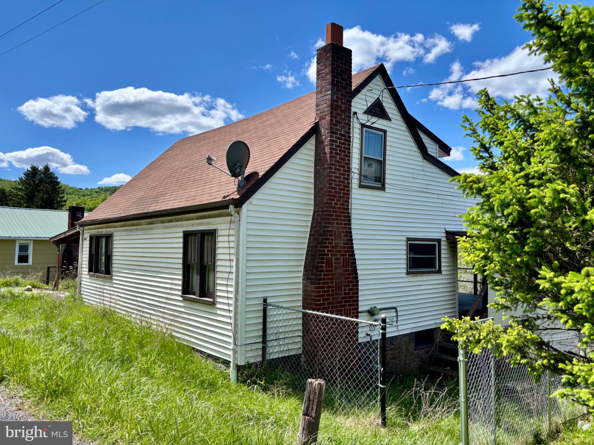 10631 New Hope Road Northwest Frostburg, MD 21532 - Photo 2 of 20 Charming home with scenic backdrop.