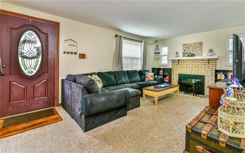 4115 Gibsonia Road Gibsonia, PA 15044 - Photo 2 of 20 This cozy, spacious living room has a fireplace and wall to wall carpeting.