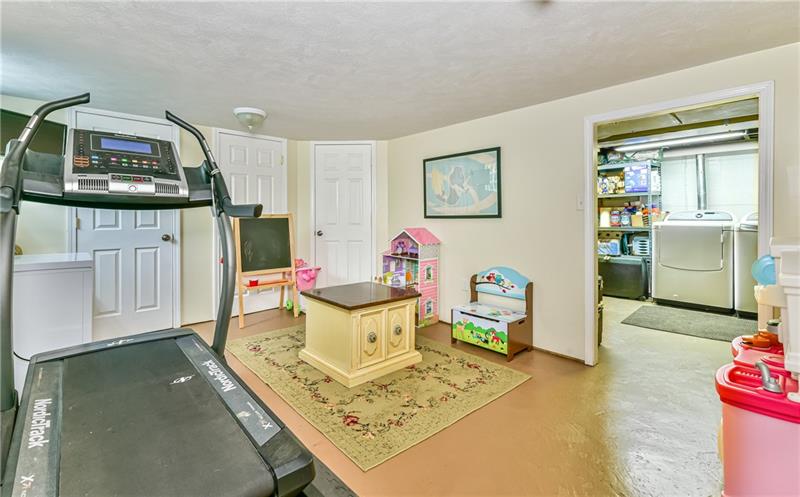 4115 Gibsonia Road Gibsonia, PA 15044 - Photo 16 of 20 Lower level game room leads to the laundry area
