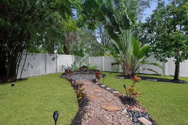 a view of backyard with green space
