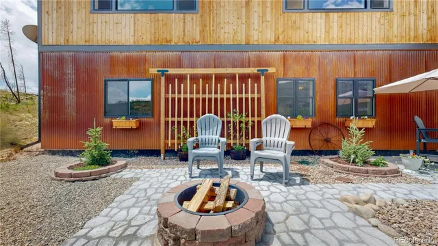 a table and chairs in front of a door