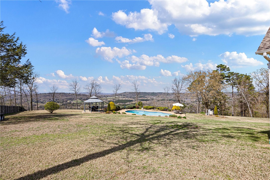 788 Cliff Road Russellville, AR 72802 - Photo 51 of 60 View of green lawn with a gazebo, an outdoor pool, and a patio area