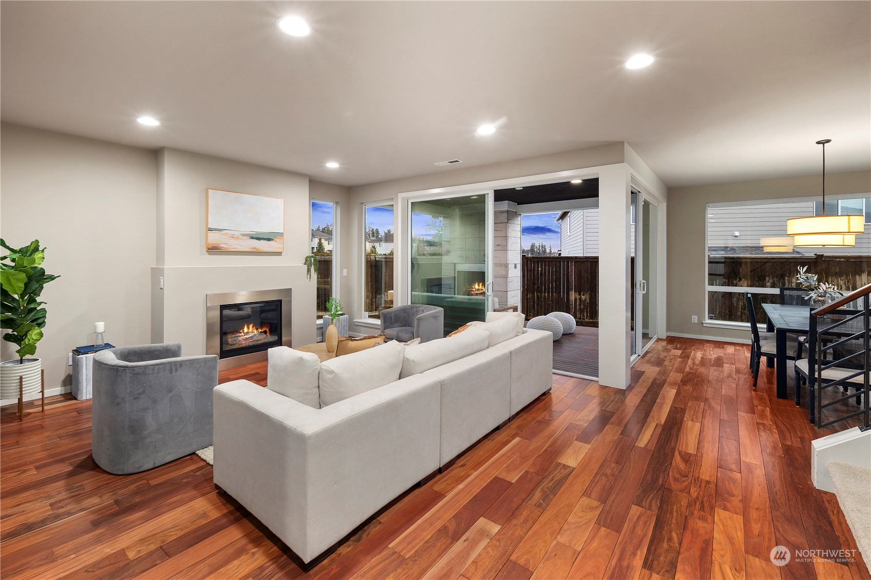 4108 171st Street Southeast Bothell, WA 98012 - Photo 11 of 40 a living room with furniture and a fireplace