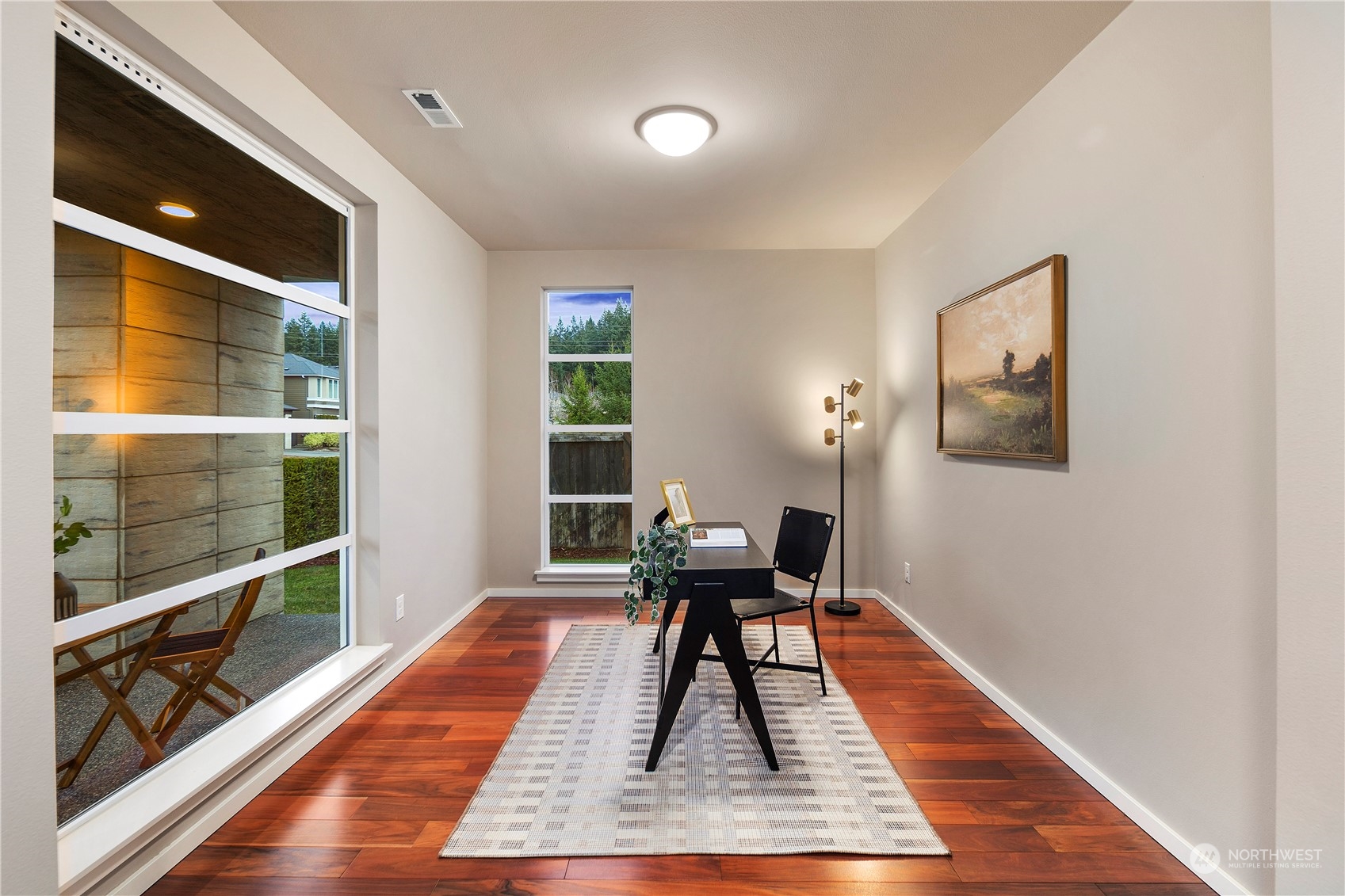 4108 171st Street Southeast Bothell, WA 98012 - Photo 14 of 40 a living room with a couch and a coffee table with wooden floor