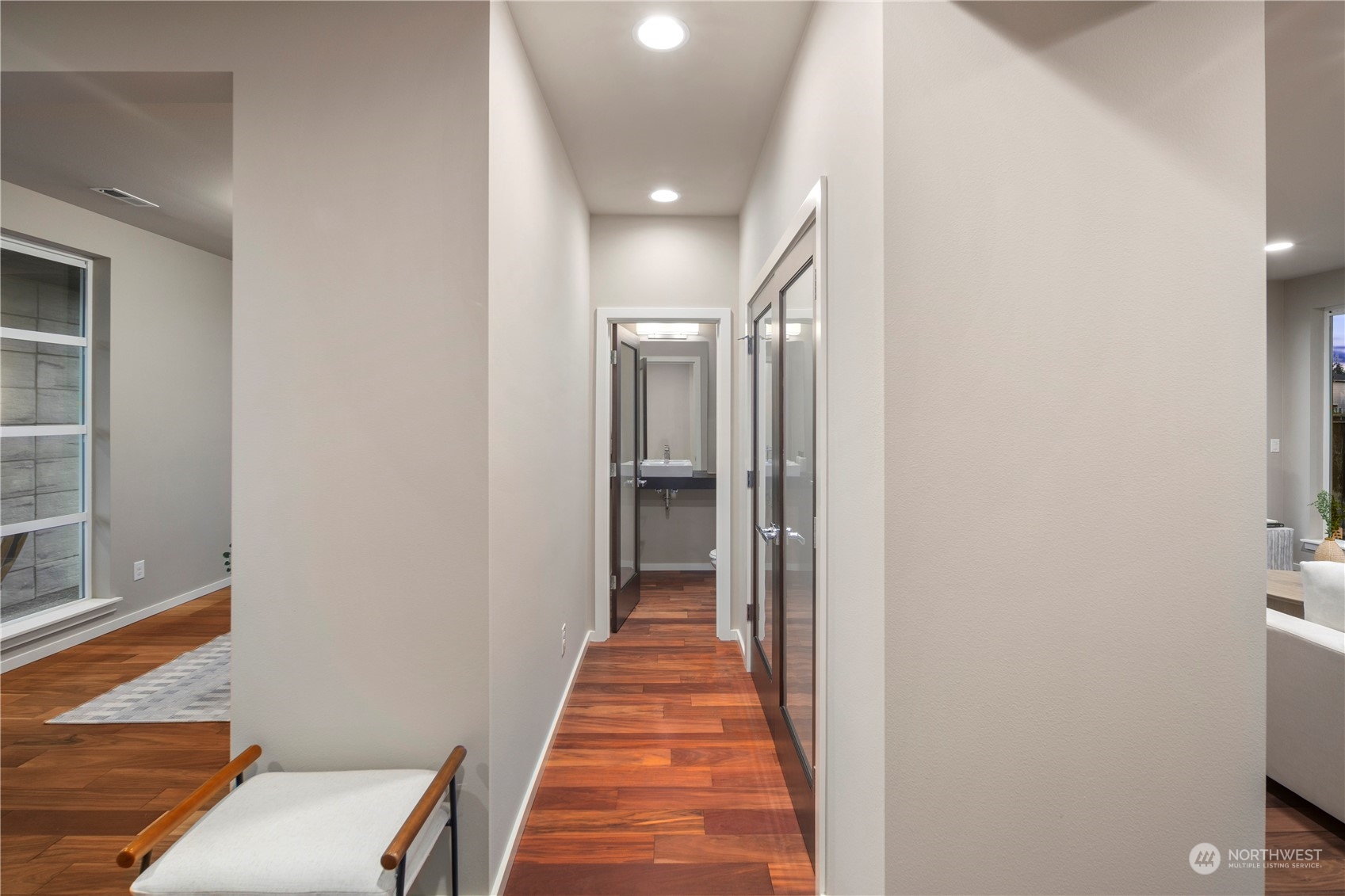 4108 171st Street Southeast Bothell, WA 98012 - Photo 15 of 40 a view of a hallway with wooden floor and a hallway