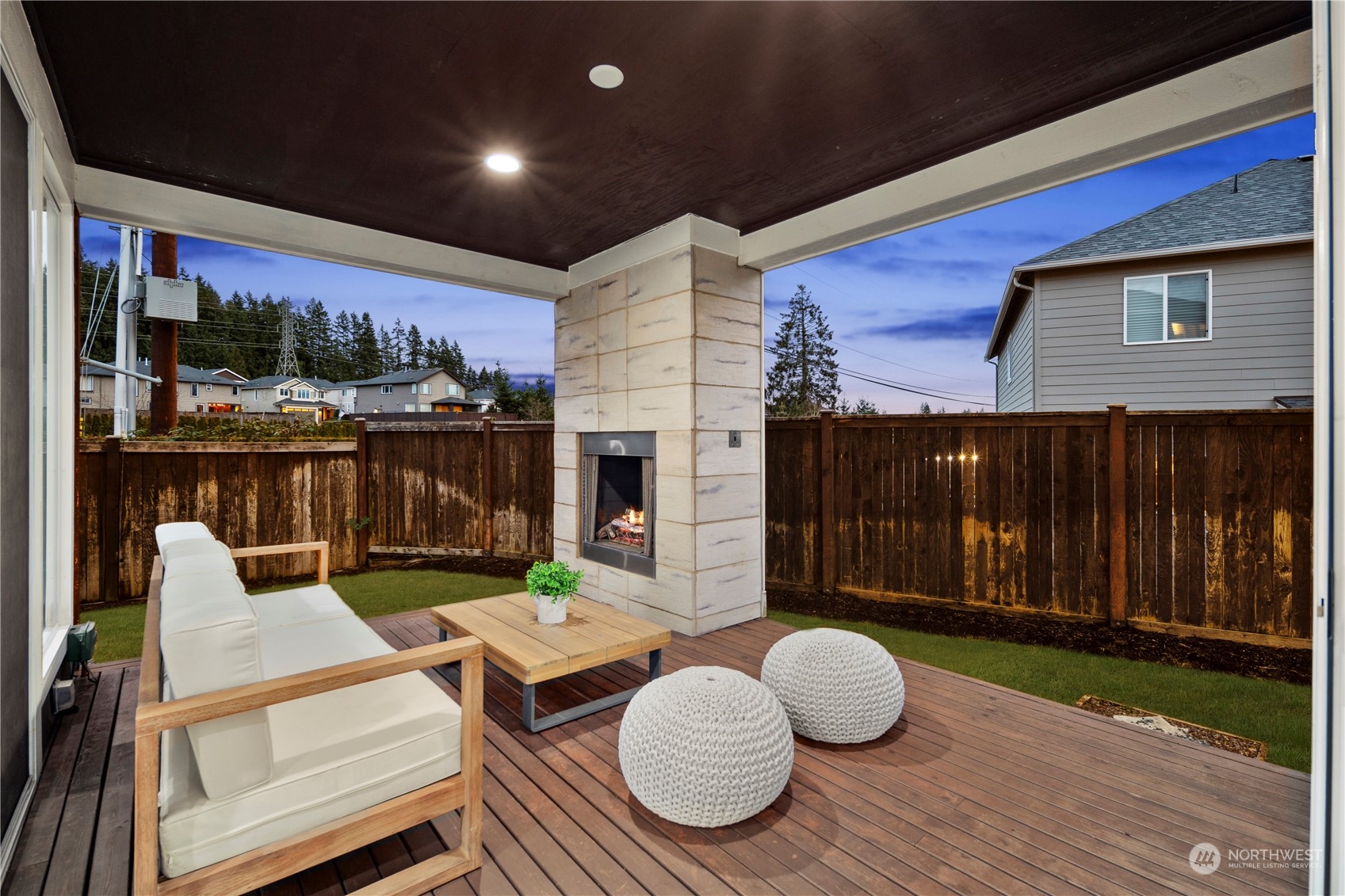 4108 171st Street Southeast Bothell, WA 98012 - Photo 17 of 40 a outdoor living space with furniture and rug