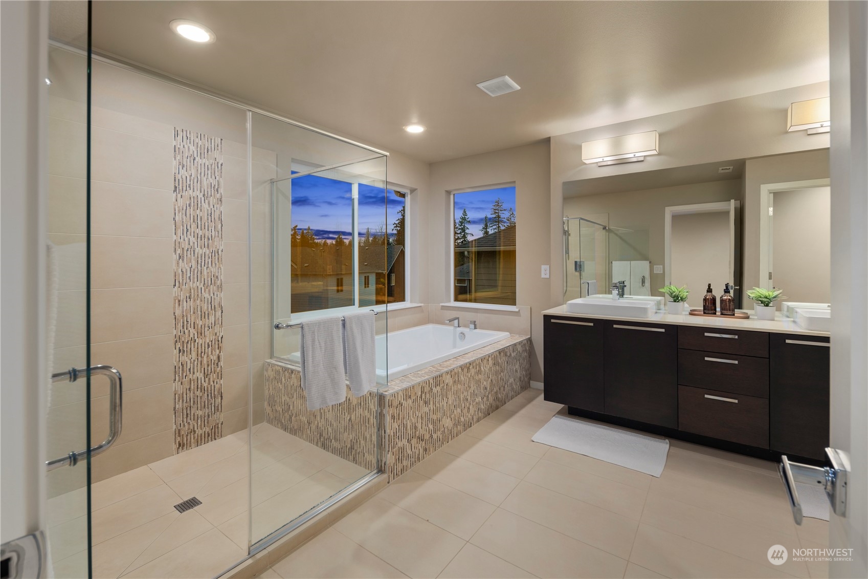 4108 171st Street Southeast Bothell, WA 98012 - Photo 21 of 40 a spacious bathroom with a tub sink shower and mirror