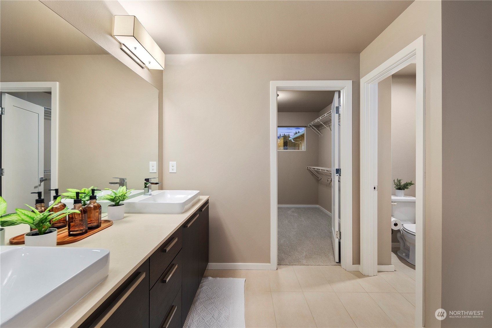 4108 171st Street Southeast Bothell, WA 98012 - Photo 23 of 40 a bathroom with a sink and a mirror