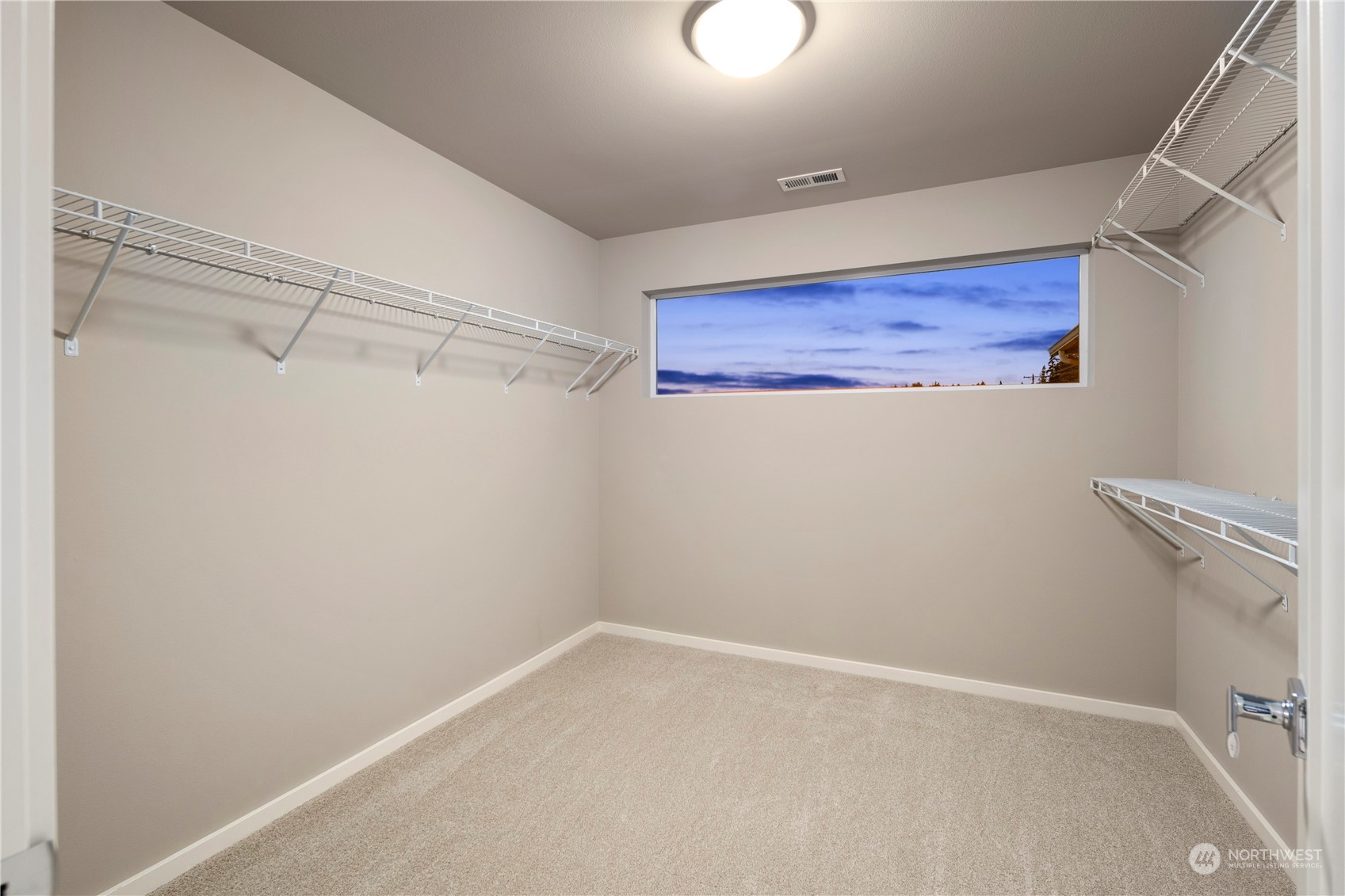 4108 171st Street Southeast Bothell, WA 98012 - Photo 24 of 40 a view of a room with racks on the wall
