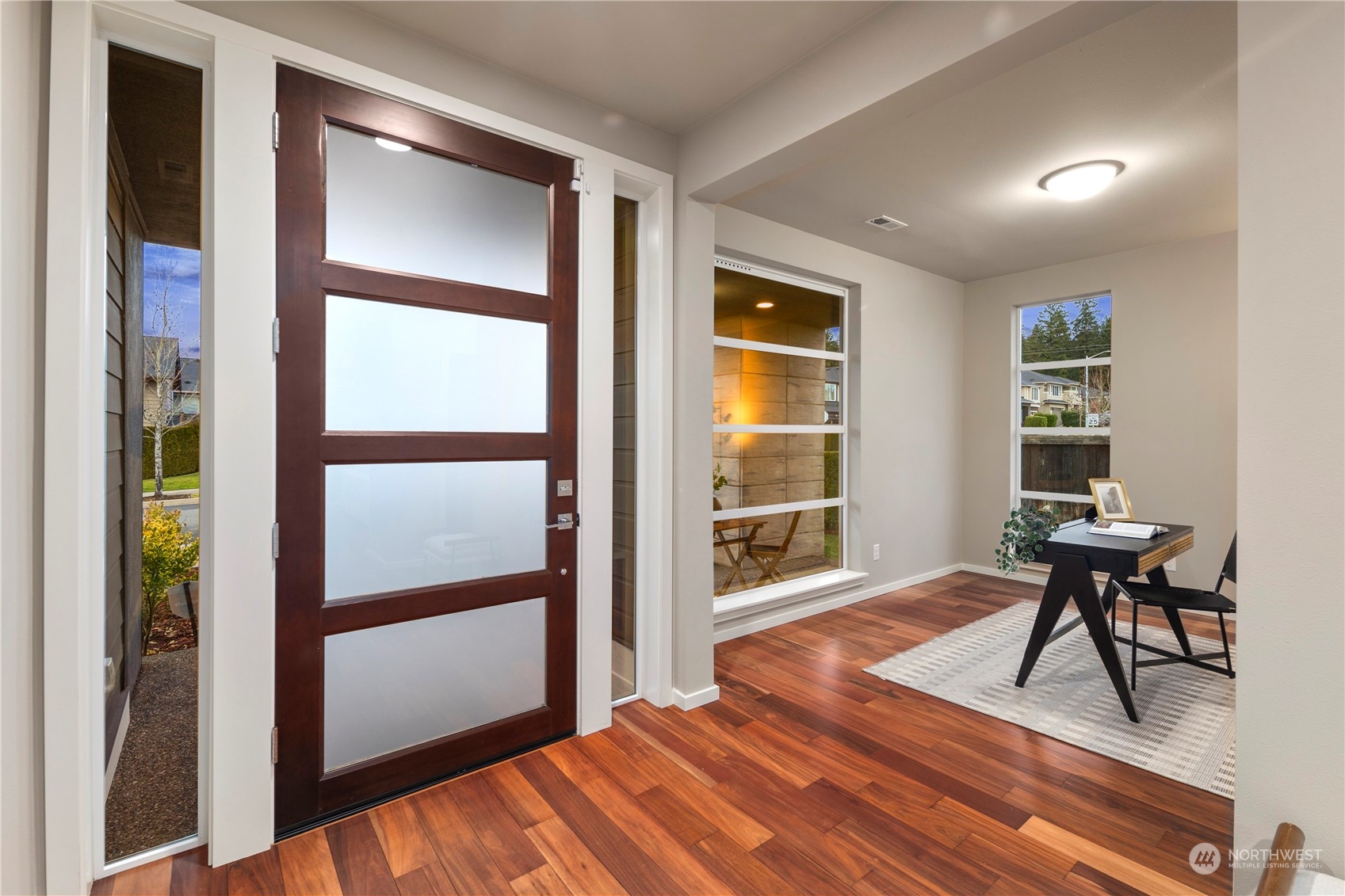 4108 171st Street Southeast Bothell, WA 98012 - Photo 3 of 40 a workspace with furniture and a window