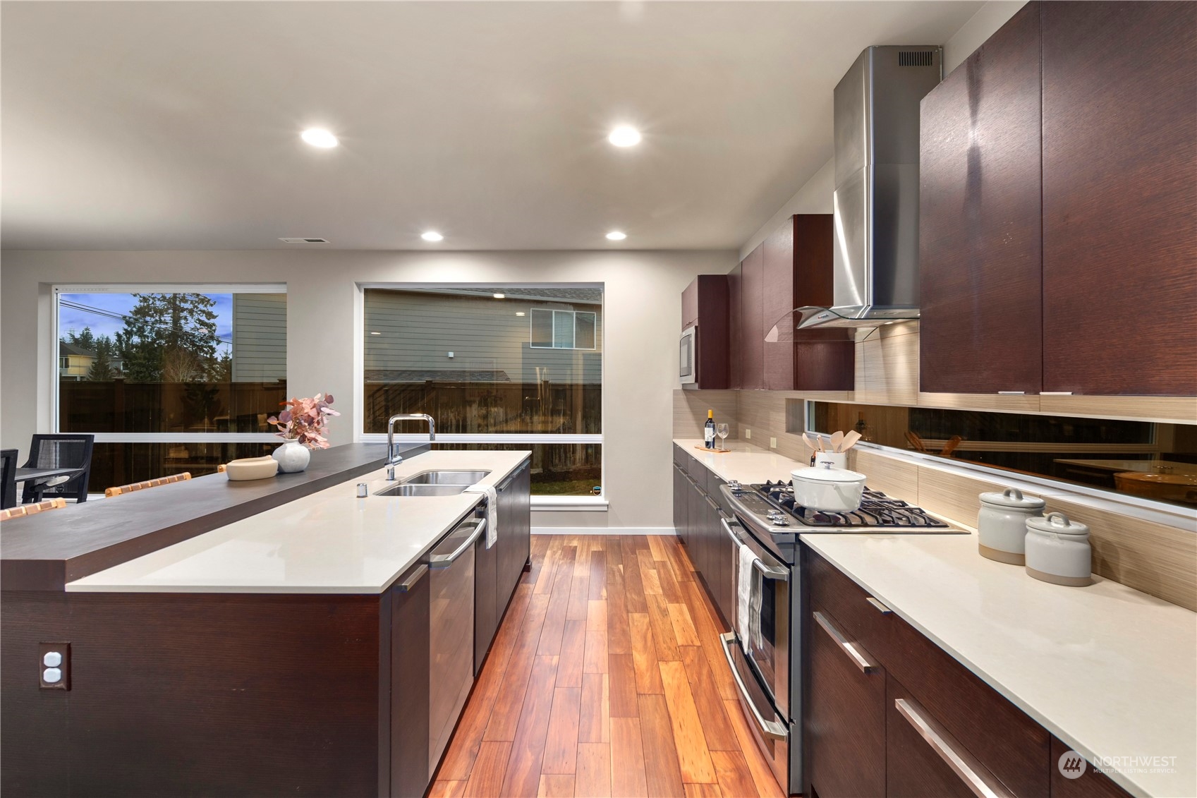 4108 171st Street Southeast Bothell, WA 98012 - Photo 5 of 40 a kitchen with a sink stove and cabinets