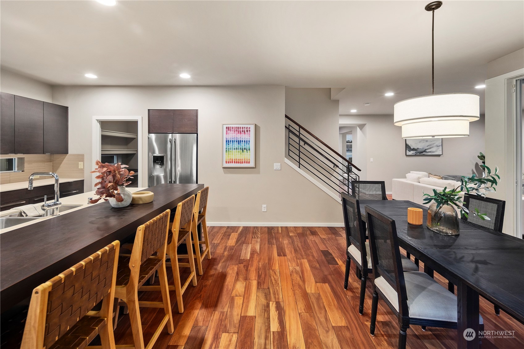 4108 171st Street Southeast Bothell, WA 98012 - Photo 6 of 40 a dining room with furniture and wooden floor
