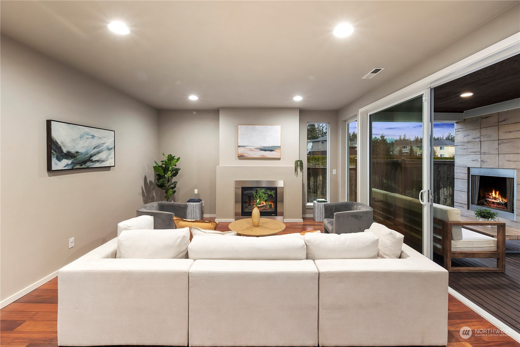 4108 171st Street Southeast Bothell, WA 98012 - Photo 10 of 40 a living room with fireplace furniture and a large window