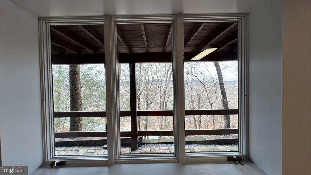 6728 Hemlock Point Road New Market, MD 21774 - Photo 20 of 28 a view of walk in closet with clothes and shoes