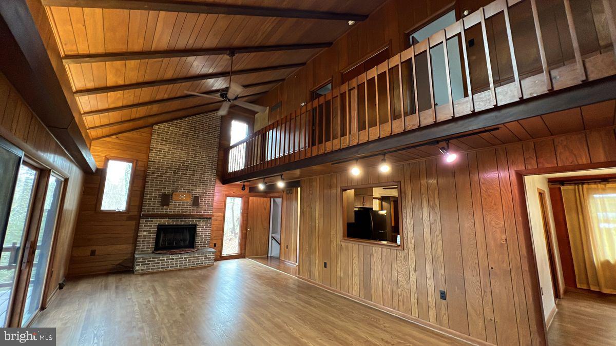 6728 Hemlock Point Road New Market, MD 21774 - Photo 2 of 28 a view of gallery with wooden floor