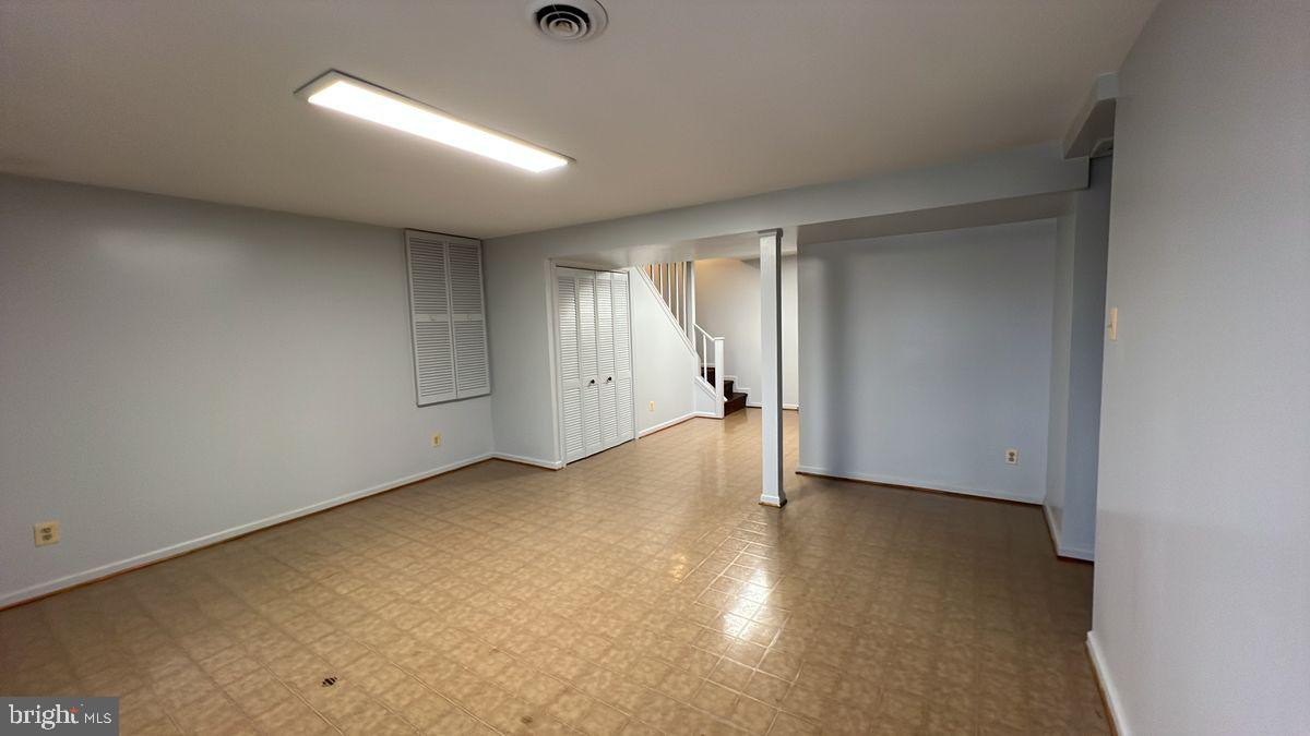 6728 Hemlock Point Road New Market, MD 21774 - Photo 21 of 28 an empty room with a natural light