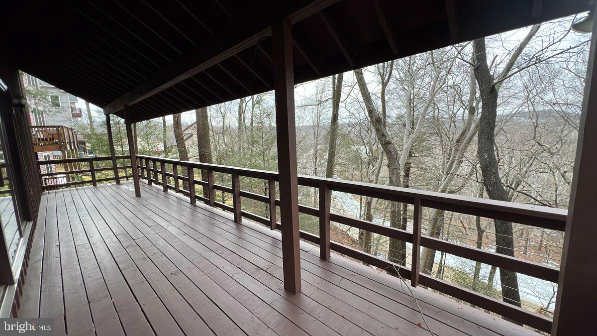 6728 Hemlock Point Road New Market, MD 21774 - Photo 25 of 28 a view of two chairs in a balcony