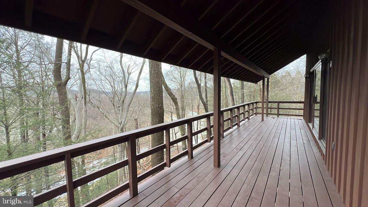 6728 Hemlock Point Road New Market, MD 21774 - Photo 27 of 28 a view of balcony with wooden floor