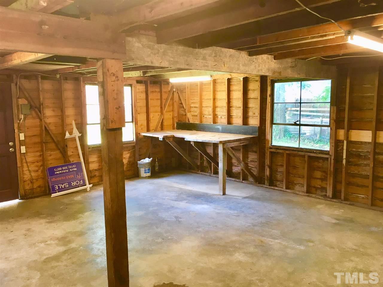 612 Brighton Road Raleigh, NC 27610 - Photo 12 of 16 a view of a room with gym equipment