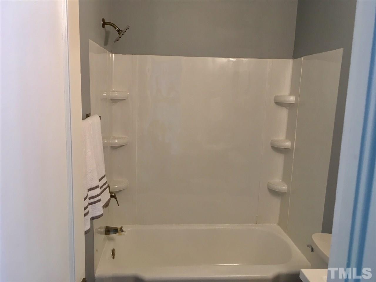 612 Brighton Road Raleigh, NC 27610 - Photo 6 of 16 a bathroom with a shower
