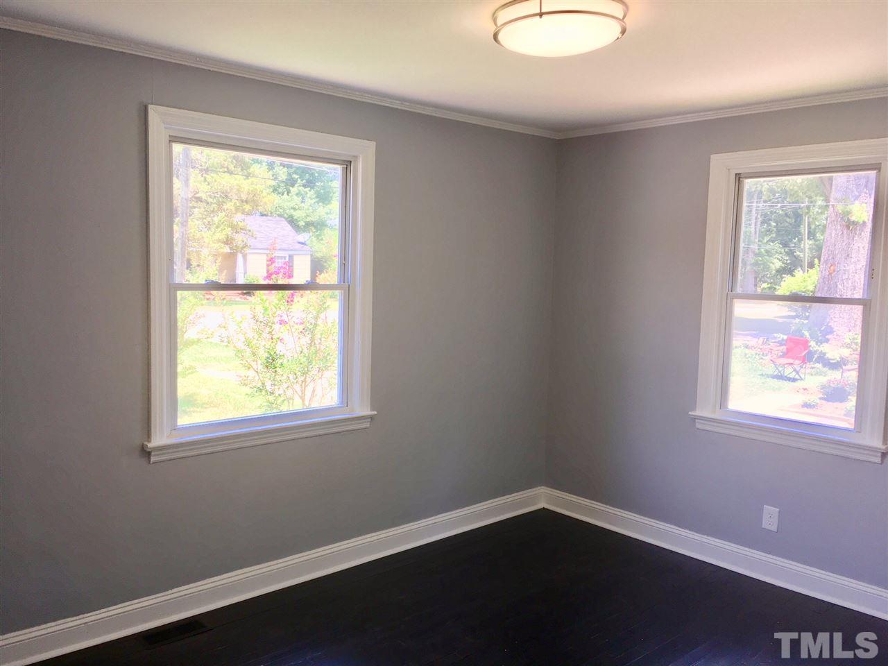612 Brighton Road Raleigh, NC 27610 - Photo 9 of 16 an empty room with a window