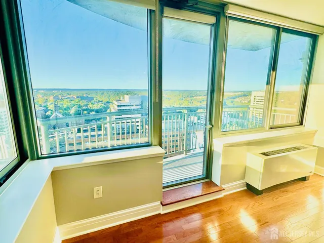 a view of a balcony with city view