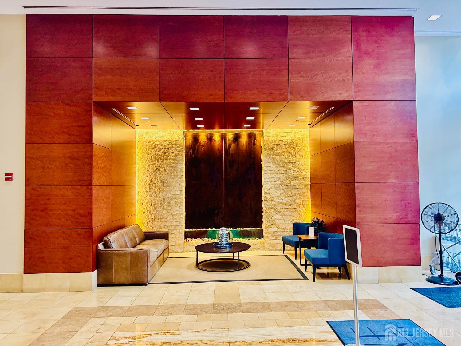 1 Spring Street, Unit 1806 New Brunswick, NJ 08901 - Photo 6 of 65 a bathroom with a sink and a mirror