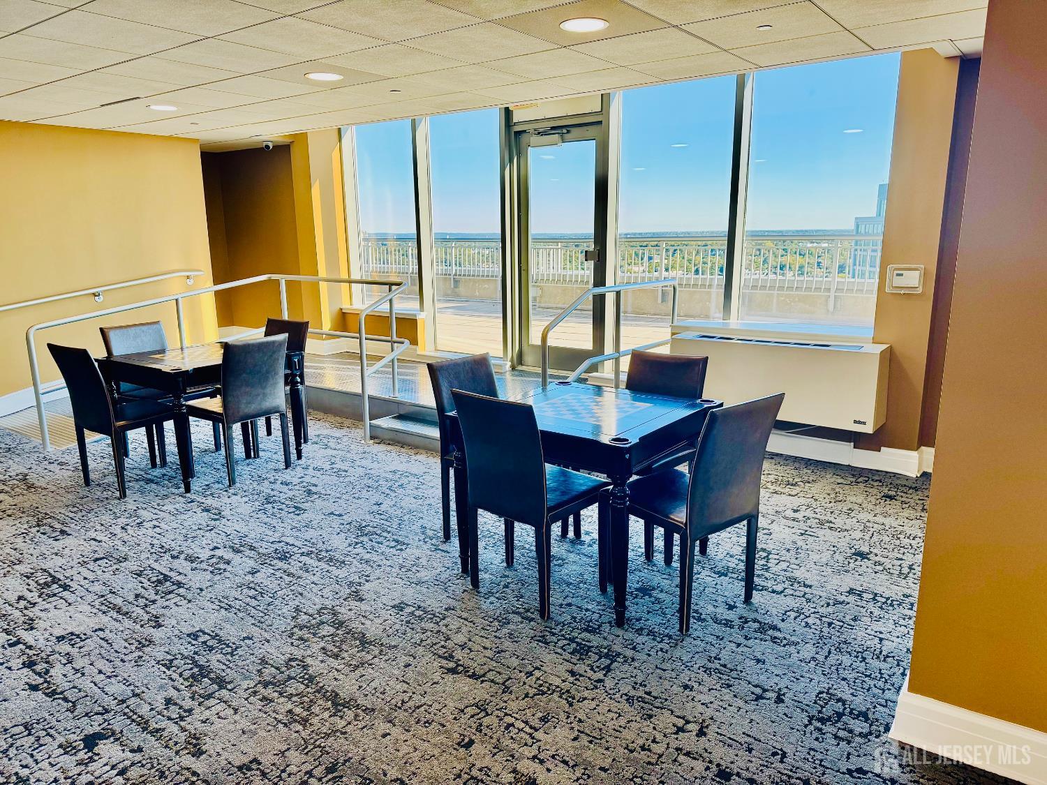 1 Spring Street, Unit 1806 New Brunswick, NJ 08901 - Photo 62 of 65 a view of a dining room with furniture window and outside view