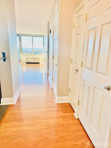 a kitchen with stainless steel appliances granite countertop a refrigerator and a stove