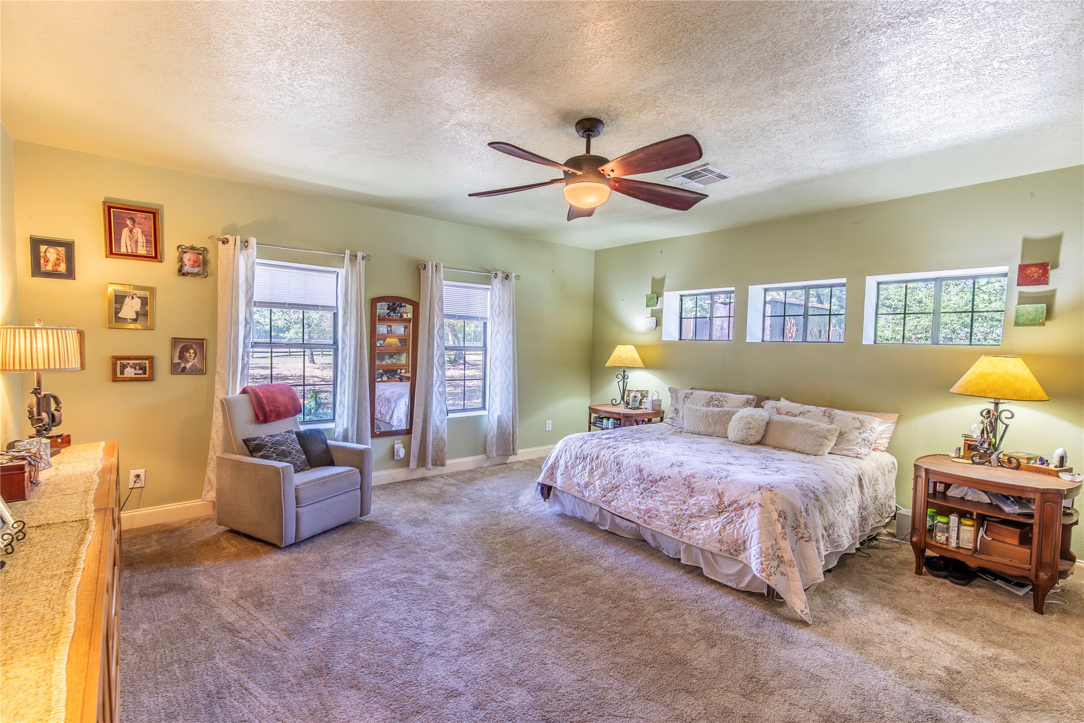 7710 Highway 36 Bellville, TX 77418 - Photo 9 of 25 The master suite is exceptionally spacious, offering comfort and privacy.