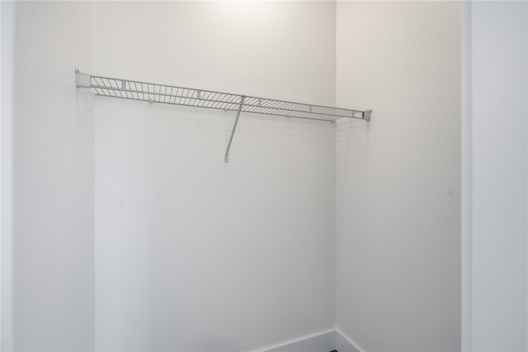115 Riley Street Westminster, SC 29693 - Photo 25 of 46 This spacious closet offers ample storage and organization solutions.