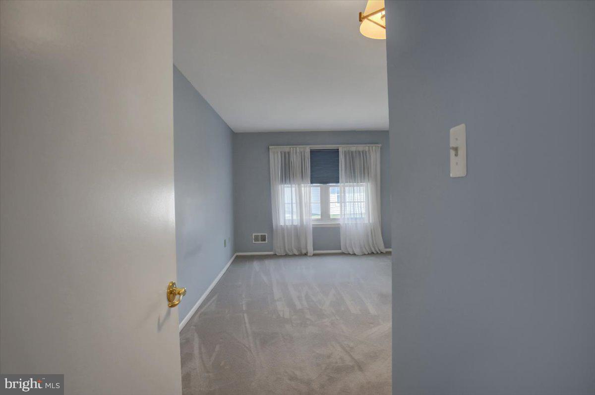 5671 Crabapple Drive Frederick, MD 21703 - Photo 15 of 31 a view of empty room with window
