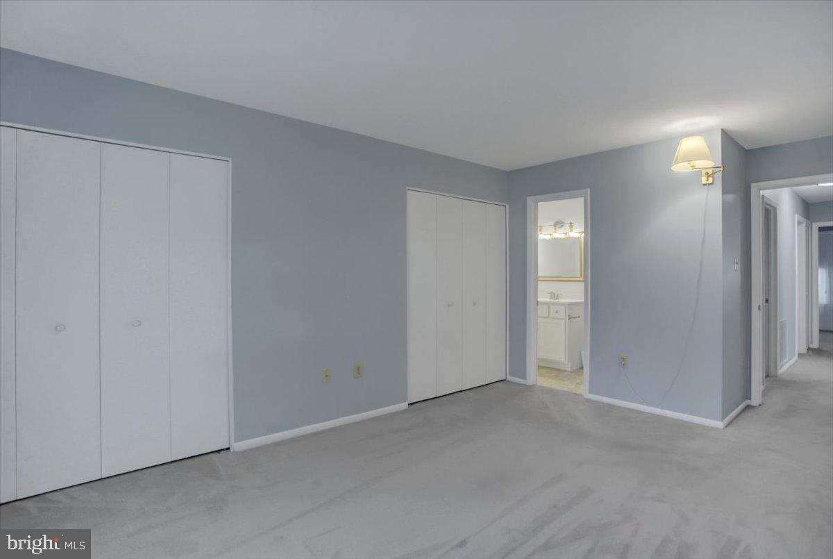 5671 Crabapple Drive Frederick, MD 21703 - Photo 16 of 31 a view of an empty room and closet area
