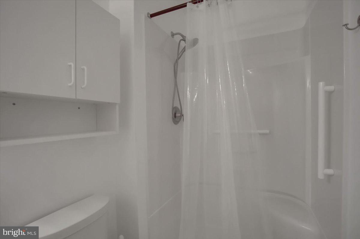 5671 Crabapple Drive Frederick, MD 21703 - Photo 19 of 31 a bathroom with a shower and a toilet