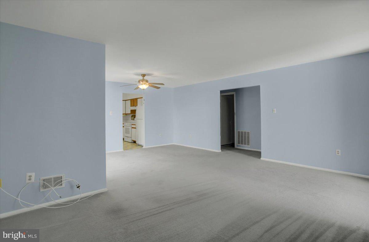 5671 Crabapple Drive Frederick, MD 21703 - Photo 20 of 31 a view of an empty room with closet and window