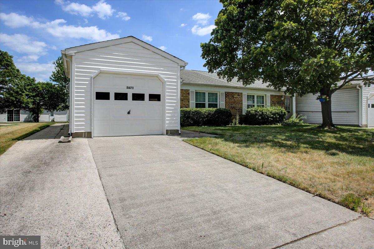 5671 Crabapple Drive Frederick, MD 21703 - Photo 23 of 31 a front view of a house with a yard