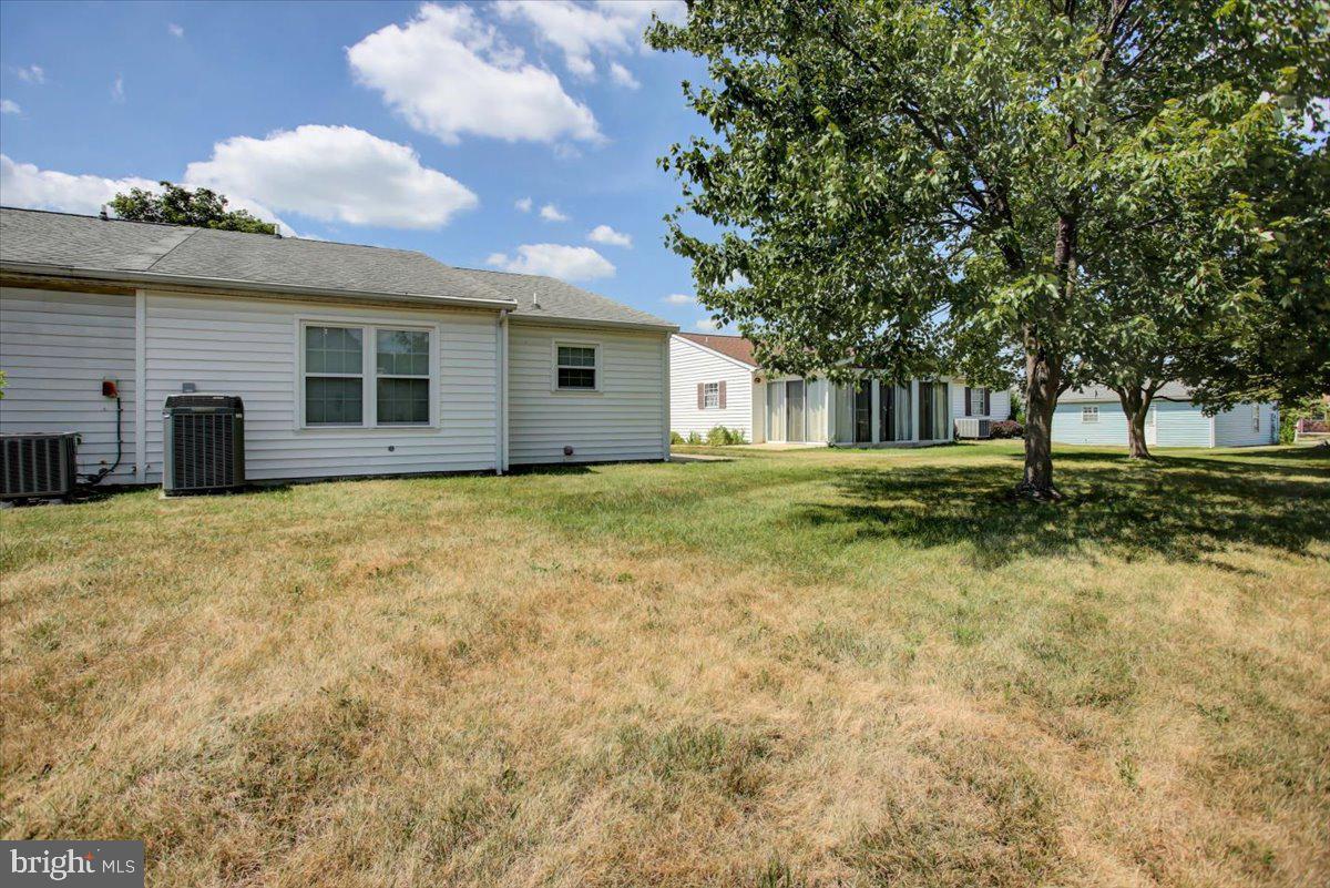 5671 Crabapple Drive Frederick, MD 21703 - Photo 26 of 31 a view of a house with a yard