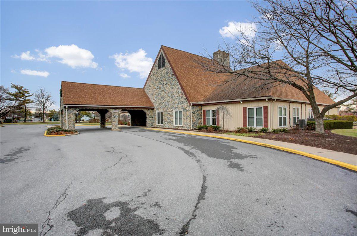 5671 Crabapple Drive Frederick, MD 21703 - Photo 30 of 31 a front view of a house with a yard