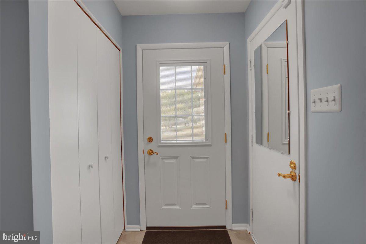 5671 Crabapple Drive Frederick, MD 21703 - Photo 8 of 31 a view of an entryway with wooden floor